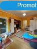 Szandaszlsn , 70 m2 -es , ignyes laks , garzzsal egyt